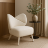 Fotel wypoczynkowy vintage z beżowej tkaniny boucle – retro design i elegancja